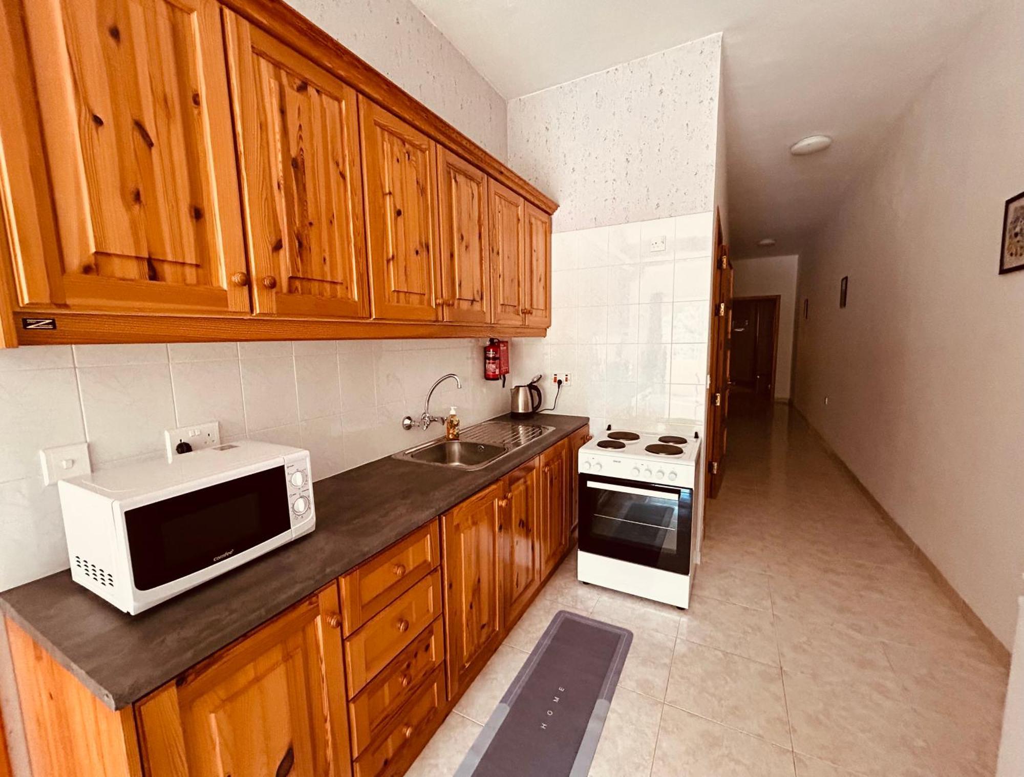 Arzella Apartments Xlendi Stylish Stay Near Beach Local Eats Ngoại thất bức ảnh